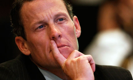 Lance Armstrong with fingers on lip