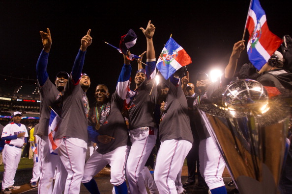 Team Dominican Republic celebrates on the mound after winning the 2013 World Baseball Classic Championship Game against Team Puerto Rico