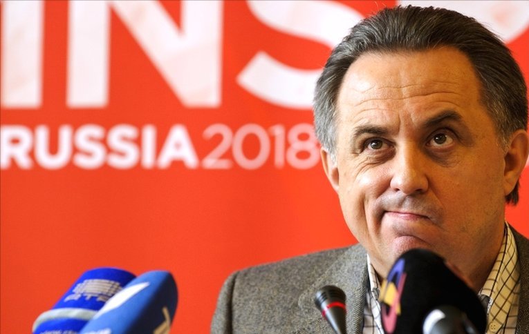 Vitaly Mutko in front of Russia 2018 sign