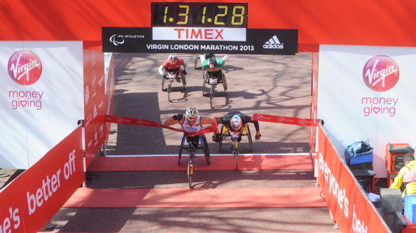 Kurt Fearnley winning the 2013 Virgin London Marathon wheelchair race followed by Marcel Hug