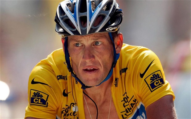 Lance Armstrong with yellow jersey zip down