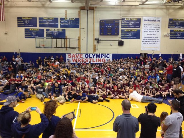 Save Olympic Wrestling banner