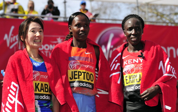 Yukiko Akaba Priscah Jeptoo and Edna Kiplagat after the 2013 Virgin London Marathon