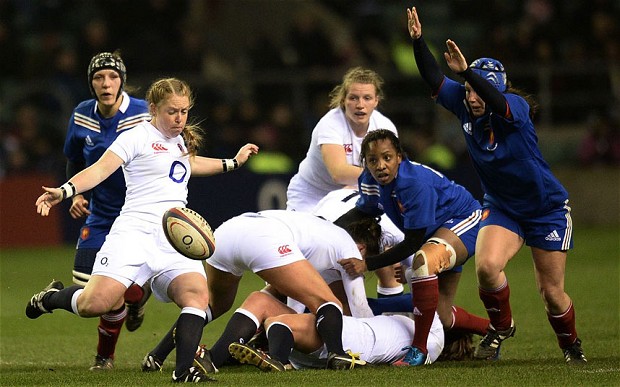 England scrum half La Toya Mason kicks the ball up the pitch against France in their Six Nations clash