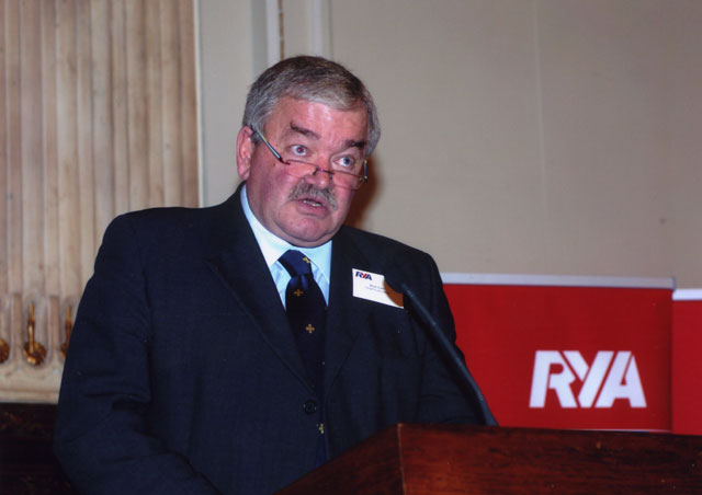 Rod Carr in front of RYA logo