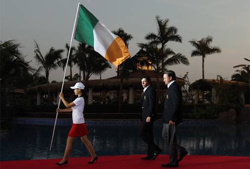 Rory McIlroy behind Irish flag Mission Hills World Cup 2011