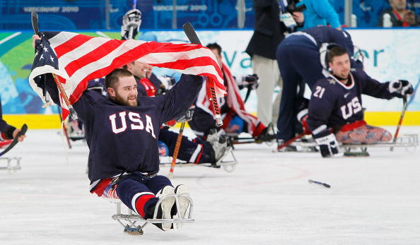 Taylor Lipsett celebrates his teams gold medal win at the Vancouver 2010 Winter Paralympics