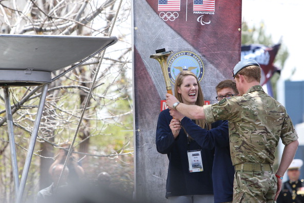 HRH Prince Harry R joins Missy Franklin and Brad Snyder in lighting the Warrior Games torch during the Opening Ceremony of the Warrior Games