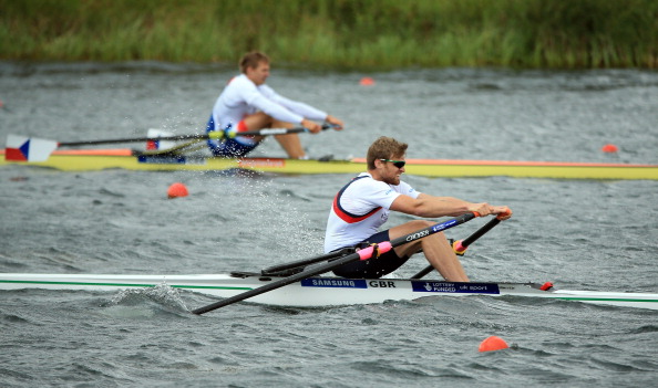 Alan Campbell of Great Brtain is beaten into second place by Ondrej Synek of The Czech Republic in the Mens Single Sculls final during the third day of the 2013 Samsung World Rowing Cup II at Eton Dorney