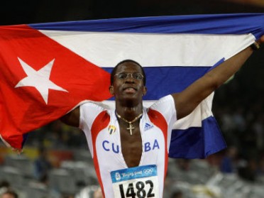 Dayron Robles with Cuban flag