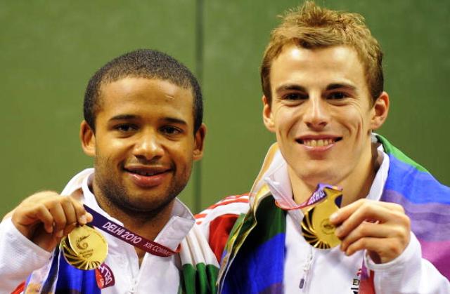 Adrian Grant left who will be competing in Rotterdam and doubles partner Nick Mathew celebrate Commonwealth Gold at Delhi 2010