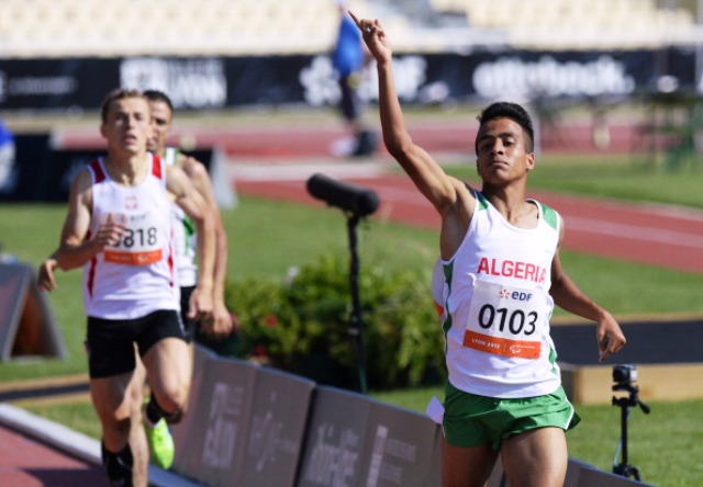 Algerias Abdellatif Baka crosses the line in Lyon to add the world title to his T13 800m Paralympic gold