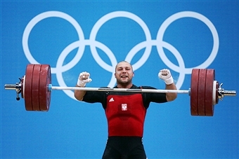 Bartlomiej Wojciech Bonk of Poland competes in the Mens 105kg