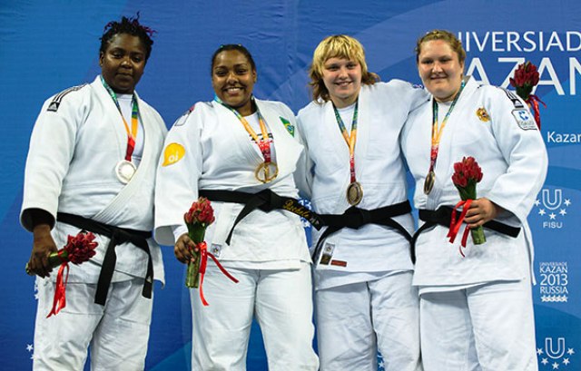 Brazils Rochele Nunes second from left caused a big upset defeating Olympic gold medallist Idalys Ortiz Bocourt from Cuba far left in the 78kg final