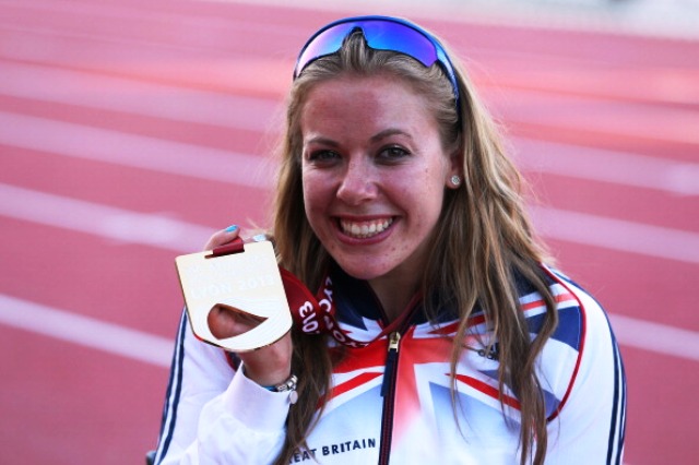 Great Britains Hannah Cockroft celebrates with her World Championship gold medal in Lyon