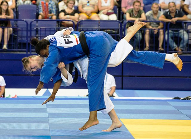 Hungarian Abigel Joo gets the better of Madeleine Malonga of France in the final of the womens judo -78kg category at Kazan 2013