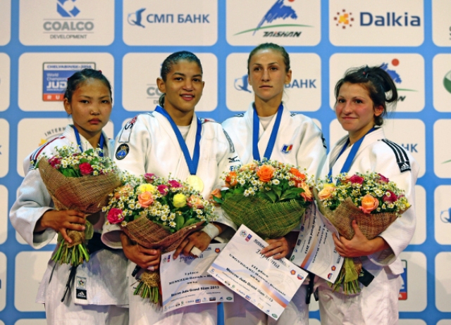 Olympic champion Sarah Menezes of Brazil second from left defended her Moscow Judo Grand Slam title