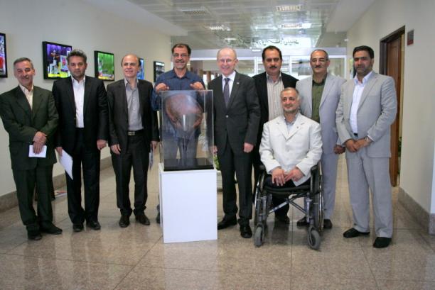 Wilfried Lemke poses with members of Irans National Paralympic Committee
