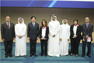 Wu poses with the Doha 2015 delegation
