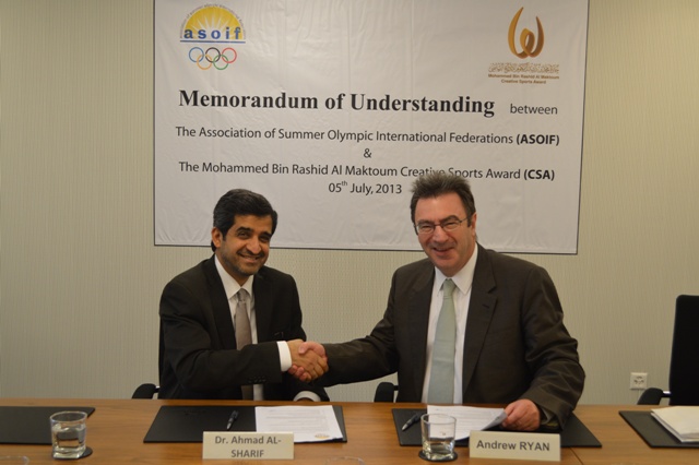 Andrew Ryan and Dr Ahmad Al-Sharif sign cooperation agreement