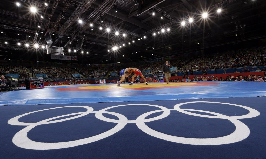 Olympic wrestling is up against baseball-softball and squash for a place on the 2020 Olympic sports programme