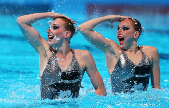 Svetlana Romashina and Svetlana Kolesnichenko of Russia compete in the Synchronized Swimming Duet Technical final