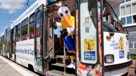 2014 Hockey World Cup mascot Stockey takes a ride on the official tram