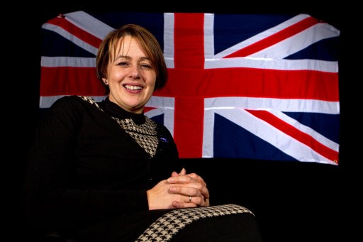Baroness Tanni Grey Thompson in front of GB flag