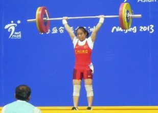 Chinese weightlfiter Huihua Jiang dominated the women's under 48 kilogram event to win the first gold medal of the Asian Youth Games in Nanjing