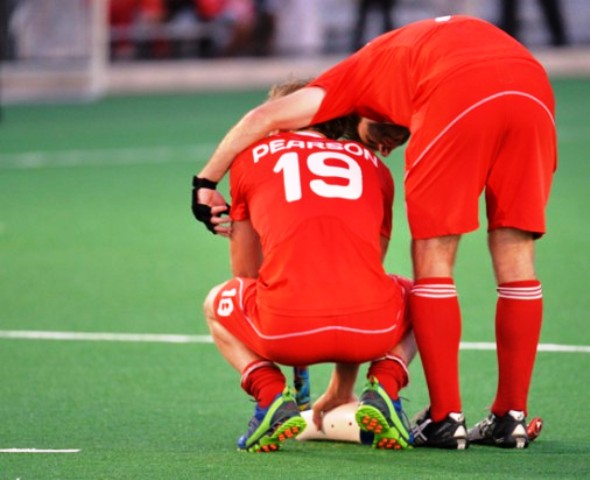 Dejected Canadian players following their defeat to Argentina in the Pan American Cup final
