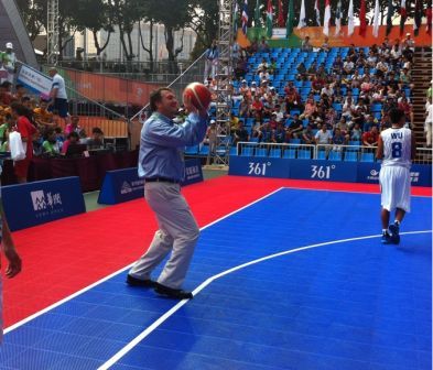 Hasan Arat playing basketball at Asian Youth Games