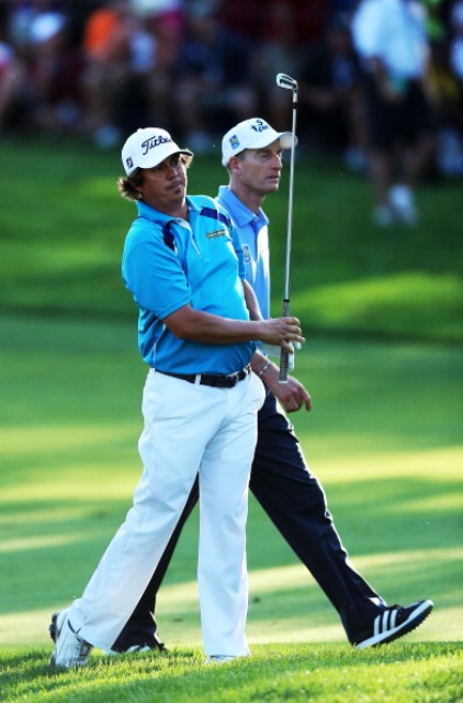 Jason Dufner left held his nerve to see off the challenge of compatriot Jim Furyk to claim the USPGA Championship