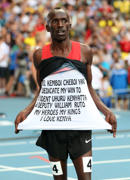 Kenya's Ezekiel Kemboi celebrated in his own fashion after winning his third consecutive world title in the 3,000 metres steeplechase, matching the record of Moses Kiptanui