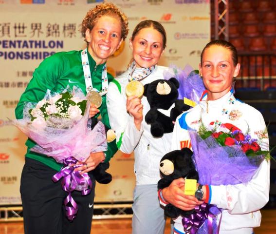 Lithuanian Laura Asadauskaite centre added the World Championship title to her Olympic gold