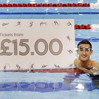 Olympic silver medallist Michael Jamieson helped Glasgow 2014 launch the first day of its ticket sales by diving into the newly revamped pool at Tollcross