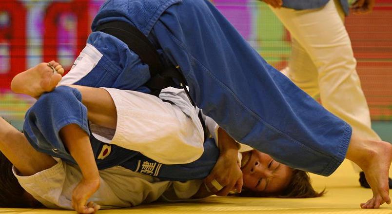 Mönkhbatyn Urantsetseg denied Japan's Haruna Asami a third consecutive world title with a brilliant performance in Rio de Janeiro