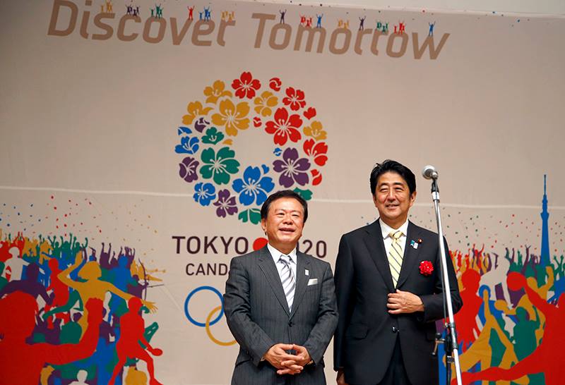 Tokyo Governor Naoki Inose (left), pictured with Japan's Prime Minister Shinzo Abe at a special rally held today, claims that the city's radiation levels are the same as London and Paris despite the Fukushima nuclear disaster which is causing international problems