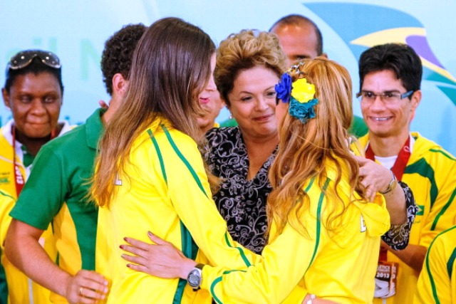 President Rousseff receives a hug from some of Brazils gold medal winning athletes in Lyon