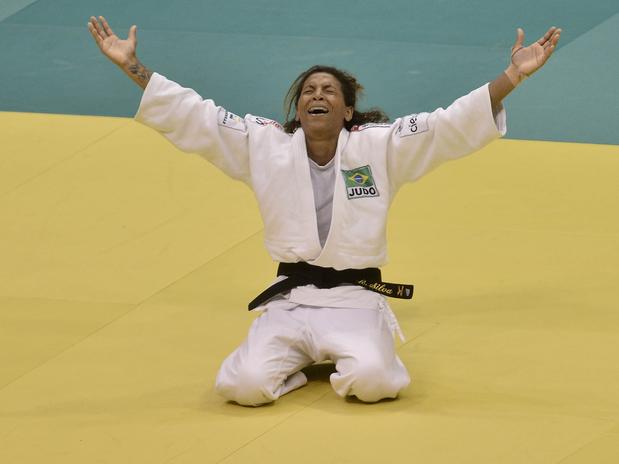 Rafaela Silva celebrates becoming the first Brazilian woman to claim a world title before her home crowd in Rio de Janeiro