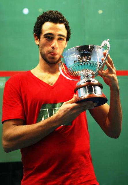 Ramy Ashour with the World Championship trophy he won in Manchester in 2008