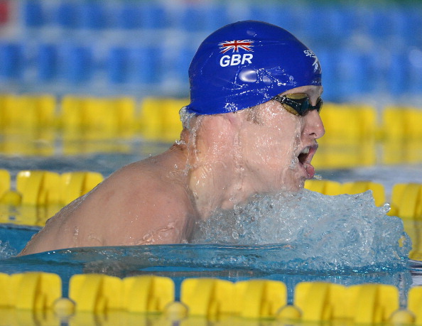 Sacha Kindred won his fourth consecutive SM6 200m medley world title as Britain took second in the medal table