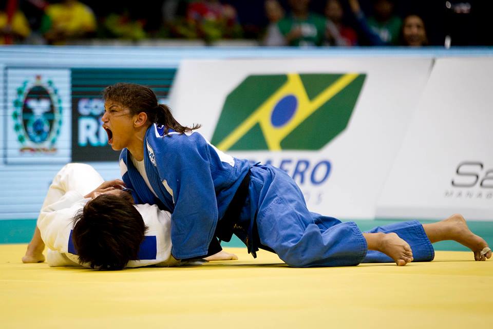 Brazil's Olympic champion Sarah Menezes had to settle for the bronze medal with victory over North Korea's Kim Sol Mi in the final second of the playoff