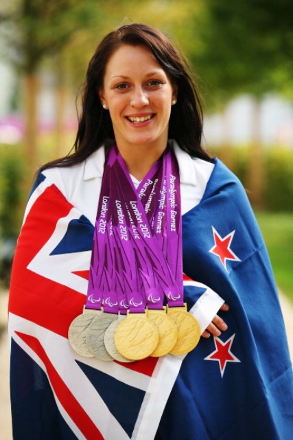 Sophie Pascoe poses with her considerable medal haul from the London 2012 Paralympic Games