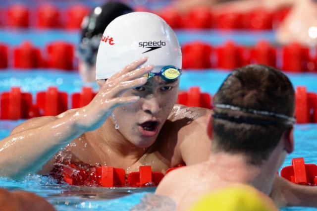 Sun Yang powered his way to three world titles at the FINA Championships in Barcelona