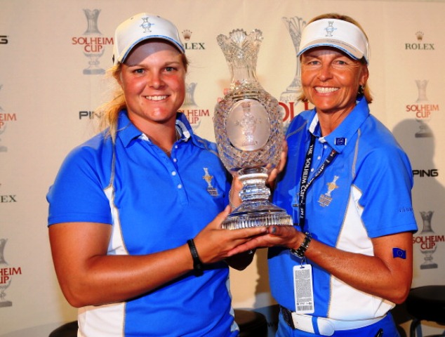 Swedes Caroline Hedwall left and European captain Lisoltte Neumann celebrate winning the Solheim Cup in Colorado