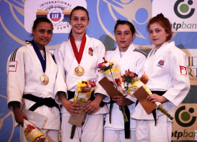 Szabina Gercsak second left secured Hungarys first gold of the Championships in the -63kg category