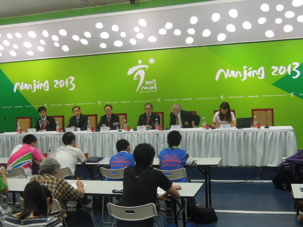 OCA vice-president Timothy Fok (fourth left) and honorary vice-president Wei Jizhong (second right) speaking on the final day of the Asian Youth Games