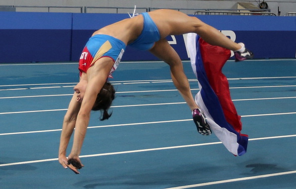 Yelena Isinbayeva somersaults after winning the womens pole vault