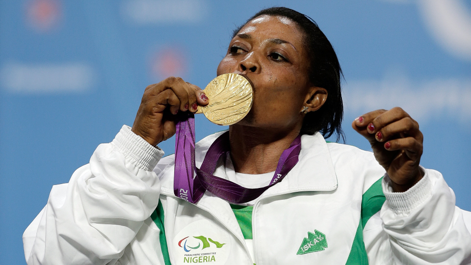 Joy Onaolapo with Paralympic gold London 2012