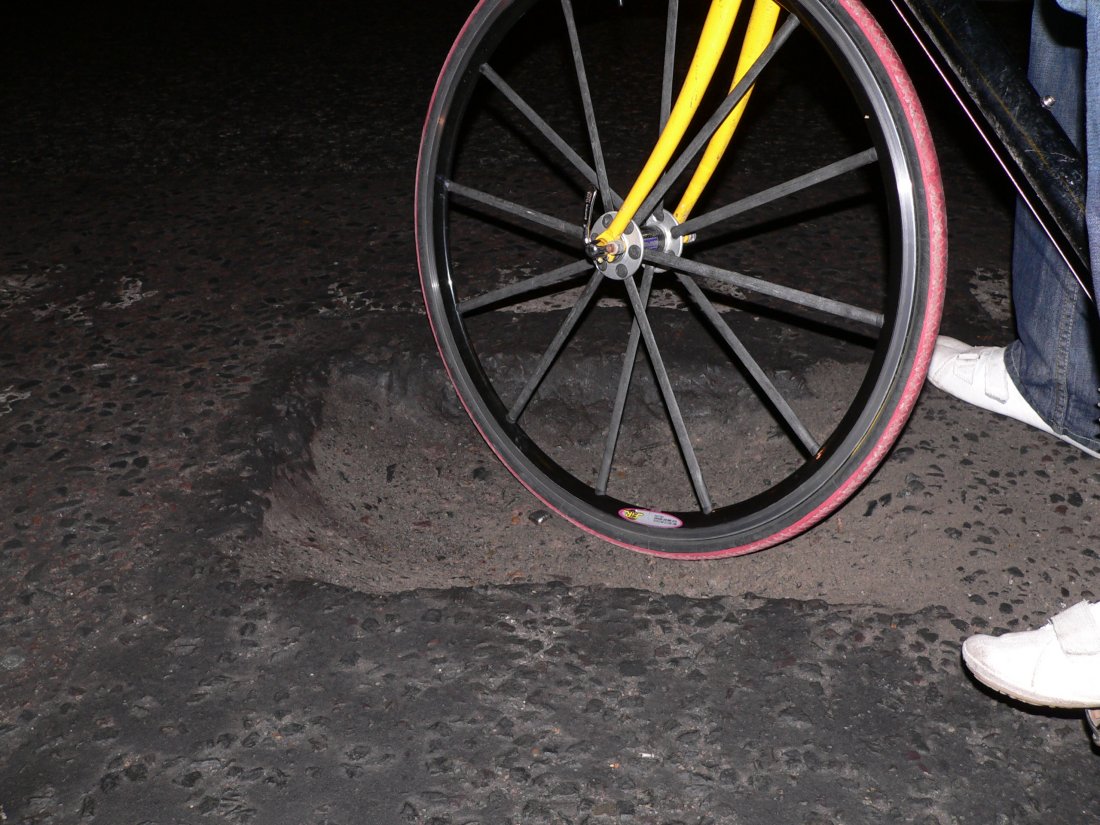 A pothole in Lambeth which is an example of the problems cyclists face on British roads